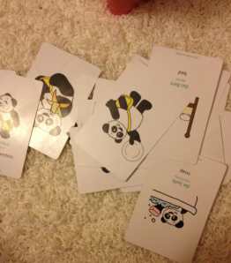 Little Pim Cards. For some reason her FAVORITE cards to play with. Stacking them up and talking to the Panda. 